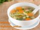 Homemade vegetable soup with a variety of fresh vegetables in a warm broth