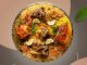 Plate of Beef Pulao with tender beef, aromatic spices, and fluffy rice.